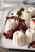 Yoghurt pannacotta with roasted plums