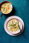 Tortellini soup with salmon, leeks, and vermouth