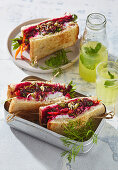 Beet sandwich with hummus and sprouts