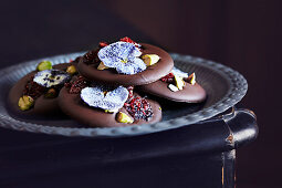 Chocolate biscuits with candied blossoms