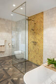 Elegant bathroom with glazed stand up shower stall