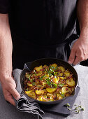 Fried potatoes with bacon