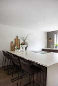 Kitchen island with bar stools