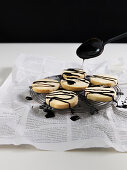 Lemon biscuits with licorice syrup drizzle