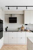 Bright kitchen with built-in appliances