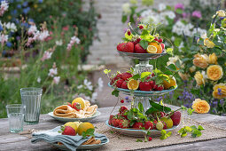 Strawberries on an etagere as summer table decoration