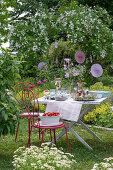 Set table for summer party in the garden