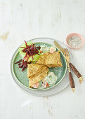 Filled crêpes with vegetable ragout and beetroot salad
