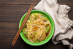 Lo mein noodles with broth and green onion (Asia)