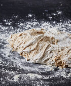 Bread dough on floured work surface