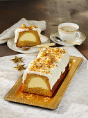 Pumpkin log cake with cheesecake center for Christmas