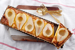 Pear tart in a baking tin