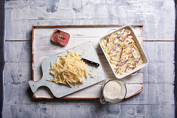 Preparing a potato and anchovy casserole