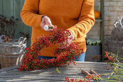 Heart of rose hips on a bent wire wreath blank