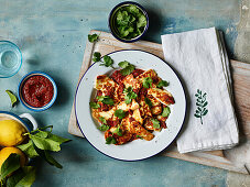 Grilled halloumi with red zhong sauce