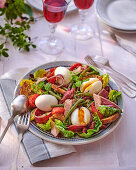 Salade Landaise (salad with foie gras, duck breast and eggs, France)
