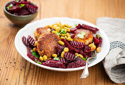 Marinated beetroot with fish cakes and edamame