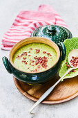 Potato and herring soup with bacon bits