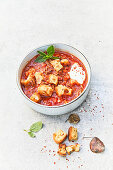 Bolgnese stew with bread cubes