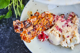 Raspberry and vanilla ice cream cake with almond brittle