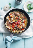 Fregola mit würzigen Muscheln und Kirschtomaten