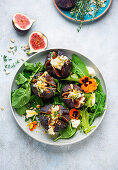 Salad with figs stuffed with goat cheese