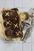 Traditional chocolate hot cross buns with candied fruit