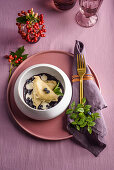 Dumplings with blueberries and cream