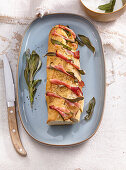 Garlic baguette with ham and sage