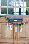 Home-made Easter bunny garland on the front door