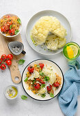 Cauliflower with herb yoghurt and tomato curry couscous