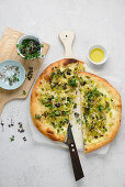 Spring pizza with sprouts