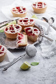 Mini pies with strawberries and lime