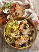 Roasted pork belly with mushroom sauce and ribbon noodles