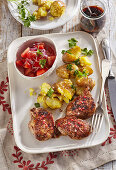 Marinated pork fillet with plum butter and squash potatoes