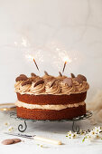 Sponge cake with chocolate buttercream and sparklers