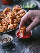 Sausage Roll into sweet chili dipping sauce