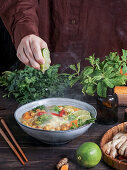 Laksa noodle soup With pumpkin and broccoli, thai spicy soup