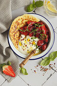 Creamy feta dip with roasted strawberries cooked in air fryer with homemade pita bread