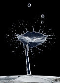 Water splash against a black background