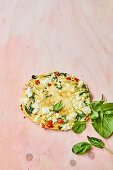 Omelette with feta cheese, spinach, and tomatoes