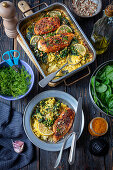 Baked chicken fillet with couscous and spinach