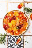 Blood orange salad with syrup and fresh rosemary