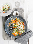 Salad with papaya, shaved fennel and chili peppers