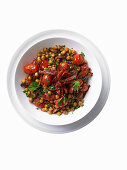 Chickpea bowl with chorizo and tomatoes