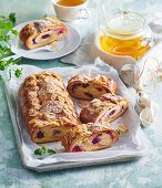 Yeast strudel with custard and berries