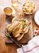 Roasted chicken in lemon thyme butter with gravy