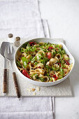 Orecchiette with peppers, raisins and almonds