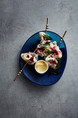 Pepperberry tempura oysters with fried curry leaves