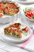Spinach quiche with tomatoes and bacon